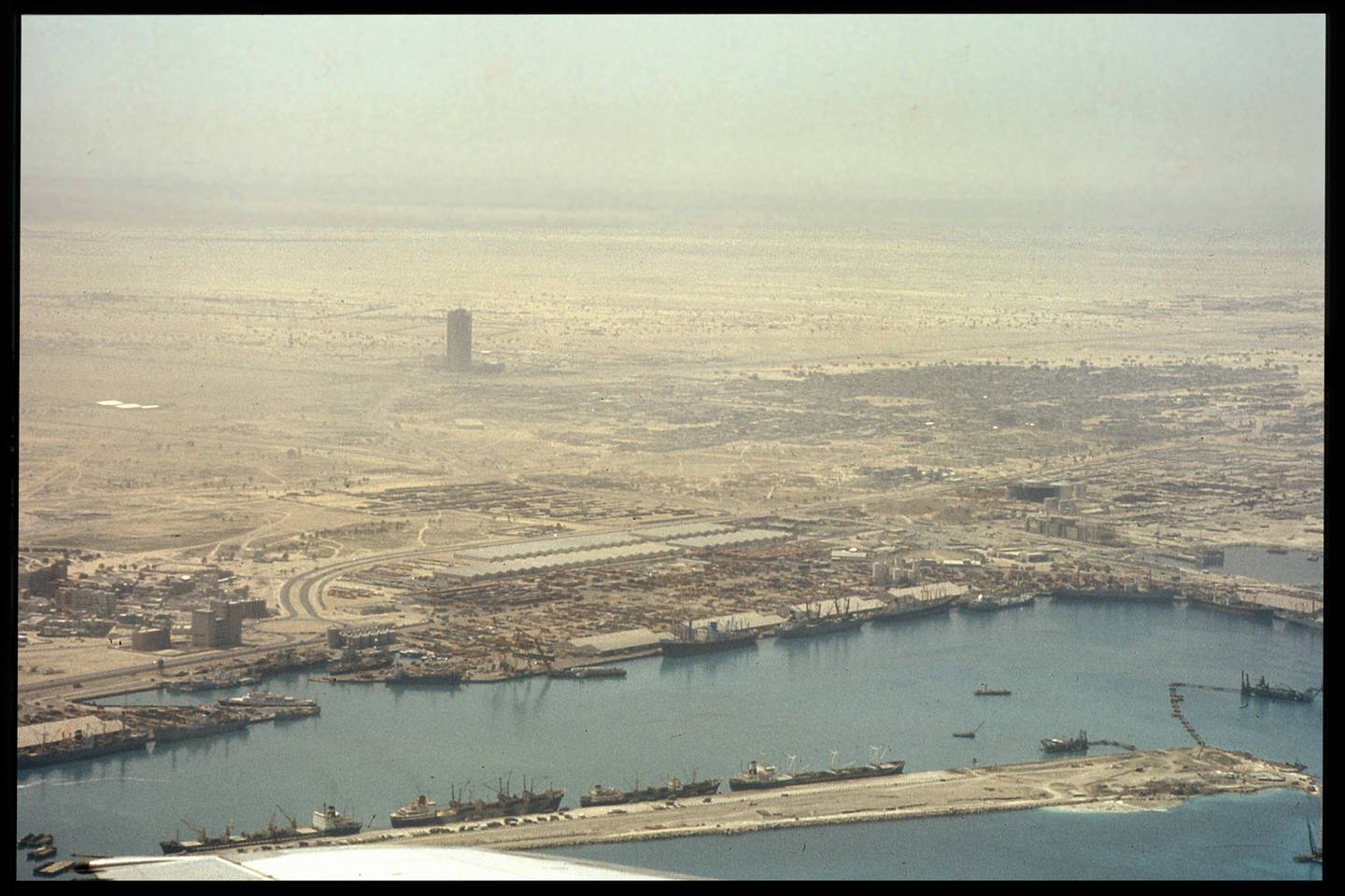 A view from above Port Rashid towards the construction site of the Dubai World Trade Centre in 1977. Photo: John R Harris Library
