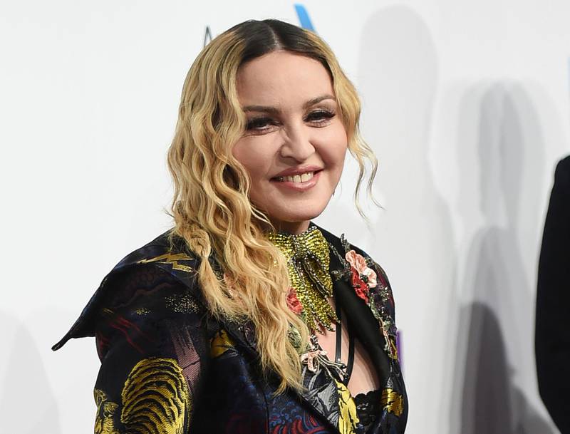 FILE - In this Dec. 9, 2016 file photo, Madonna attends the 11th Annual Billboard Women in Music honors in New York. Madonna will direct a biopic about herself for Universal Pictures. Madonna will direct and co-write with â€œJunoâ€ screenwriter Diablo Cody. (Photo by Evan Agostini/Invision/AP, File)