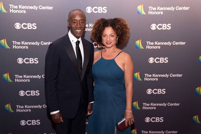 Actor Don Cheadle and wife Bridgid Coulter, wearing a teal gown. Reuters 