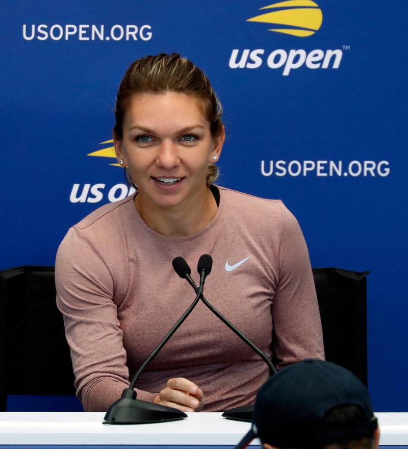 epa06969558 Romanian tennis player Simona Halep addresses the media during media day inside Armstrong stadium at the 2018 US Open Tennis Championships at the USTA National Tennis Center in Flushing Meadows, New York, USA, 24 August 2018.  EPA/JASON SZENES