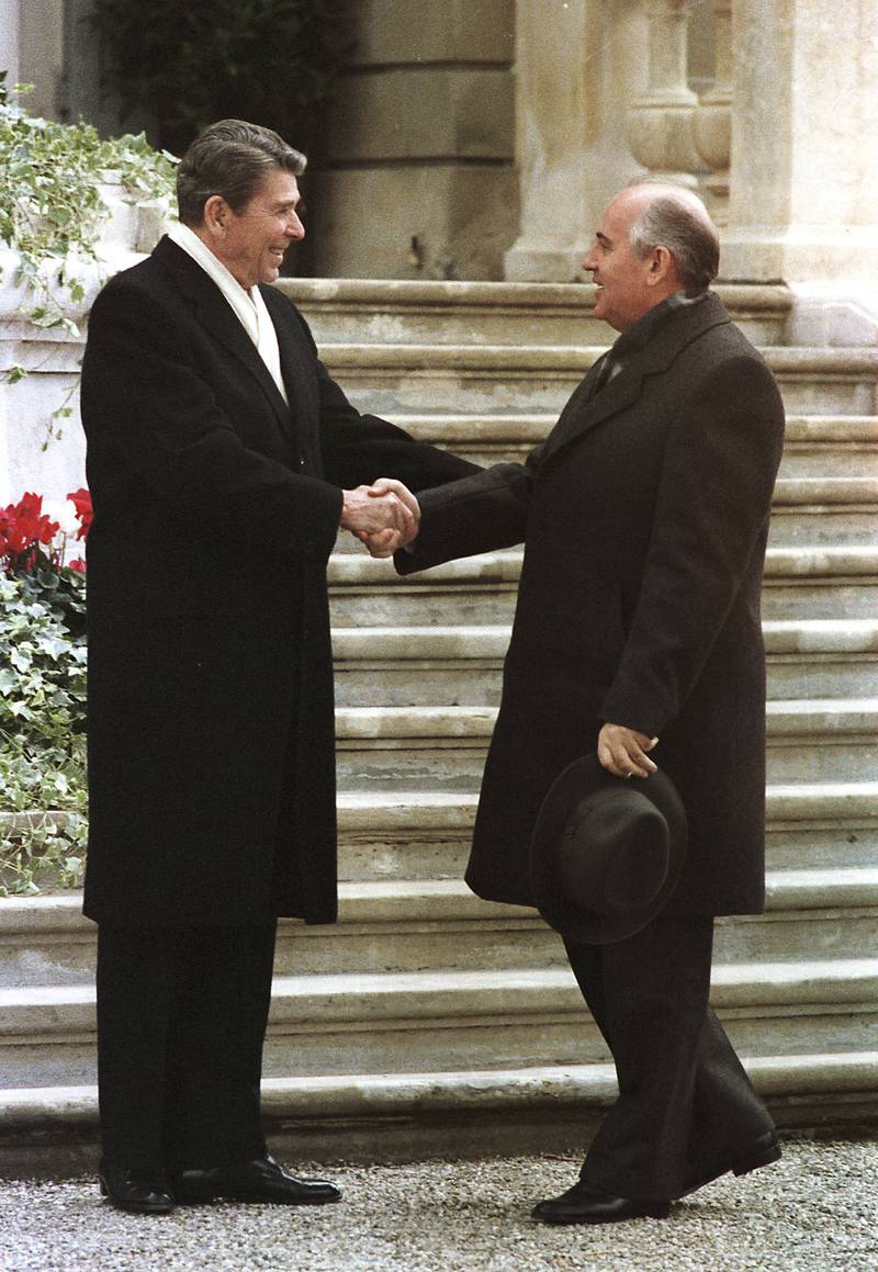 Reagan and Gorbachev meet for the first time before summit talks at the villa Fleur D'Eau at Versoix near Geneva, Switzerland, on November 19, 1985. AP