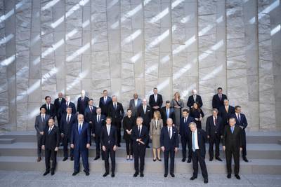 The leaders gather for a photo in Brussels. AP Photo