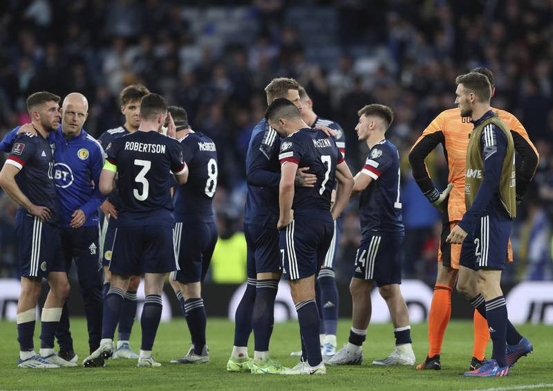 Scotland players at the end of the game. AP