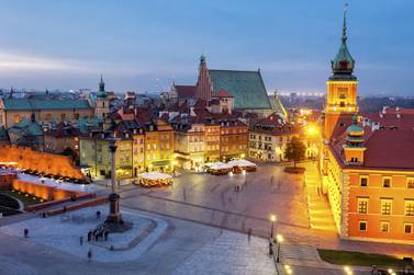 Warsaw’s Castle Square in the city’s Old Town features the landmark Sigismund’s Column and historic townhouses. iStockphoto.com