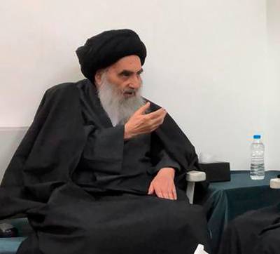 FILE - This handout photo from the office of Grand Ayatollah Ali al-Sistani shows senior Shiite cleric Grand Ayatollah Ali al-Sistani in the southern Iraqi city of Najaf on March, 13, 2019.  At least 13 people were stabbed Thursday, Dec. 5,  in Baghdadâ€™s Tahrir Square, the epicenter of Iraqâ€™s protest movement, security and medical officials said, stoking fears of infiltration by unknown groups among anti-government demonstrators. The protesters aligned with parties had marched to Tahrir earlier that day, mostly young men clad in black and waiving Iraqi flags. They chanted positive slogans in deference to Grand Ayatollah Ali al-Sistani, Iraqâ€™s most powerful Shiite cleric, and stood conspicuous against the usual crowds of Tahrir protesters.  (Office of Grand Ayatollah Ali al-Sistani, via AP)