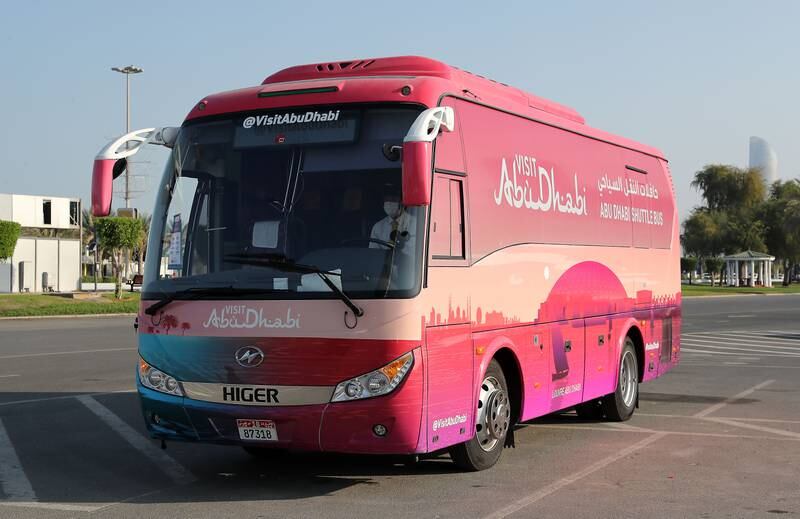 The free shuttle bus which is run by the Department of Culture and Tourism in Abu Dhabi takes tourists and residents to the city’s attractions.  Pawan Singh / The National