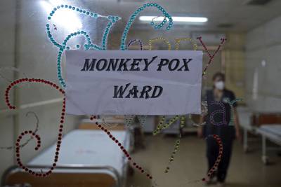 A health worker walks inside an isolation ward built as a precautionary measure for monkeypox patients at a civil hospital in Ahmedabad, India. on July 25. AFP