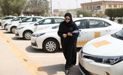 A driving instructor arrives at Saudi Aramco Driving Centre in Dhahran, Saudi Arabia. Ahmed Jadallah / Reuters