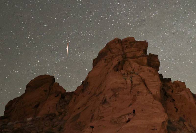 The showers put on a dazzling display in many parts of the world, including the UAE. In this image, another meteor shoots across the sky in Valley of Fire State Park. Getty images / AFP 