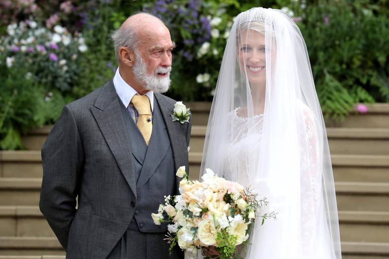 Lady Gabriella Windsor poses with her father, Prince Michael of Kent, before her wedding ceremony to Thomas Kingston at St George's Chapel in Windsor Castle, on May 18, 2019. AFP