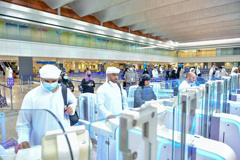 Hajj pilgrims use smart gates at Dubai Airport. The facial-recognition smart gates eliminate the need for identification documents at different points in the airport. Photo: GDFRA