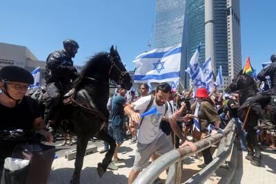Police and protesters clash on the 'Day of Disruption' opposing the judicial overhaul, in Tel Aviv. Reuters