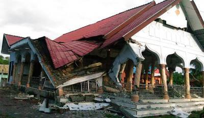 A badly damaged building is seen after the 6.5-magnitude earthquake. AFP