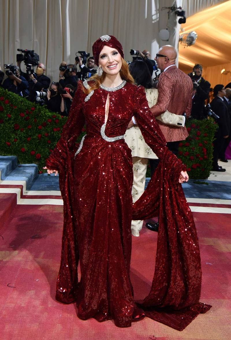 Jessica Chastain, wearing oxblood sequinned Gucci. AFP