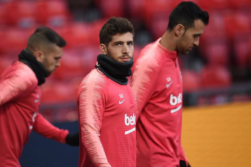 Barcelona's Spanish midfielder Sergi Roberto (C) attends a training session at Old Trafford stadium in Manchester, north west England on the eve of their UEFA Champions League quarter final first leg football match against Manchester United.  AFP