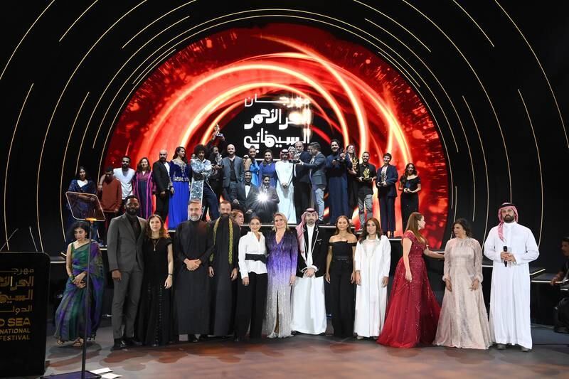 Attendees and winners on stage at the Closing Night Gala Awards at the Red Sea International Film Festival in Jeddah. All photos: Getty Images