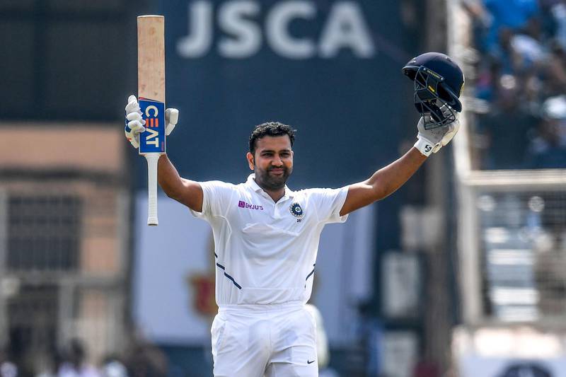TOPSHOT - India's Rohit Sharma celebrates his double century (200 runs) during the second day of the third and final Test match between India and South Africa at the Jharkhand State Cricket Association (JSCA) stadium in Ranchi on October 20, 2019. ----IMAGE RESTRICTED TO EDITORIAL USE - STRICTLY NO COMMERCIAL USE-----
 / AFP / Money SHARMA / ----IMAGE RESTRICTED TO EDITORIAL USE - STRICTLY NO COMMERCIAL USE-----
