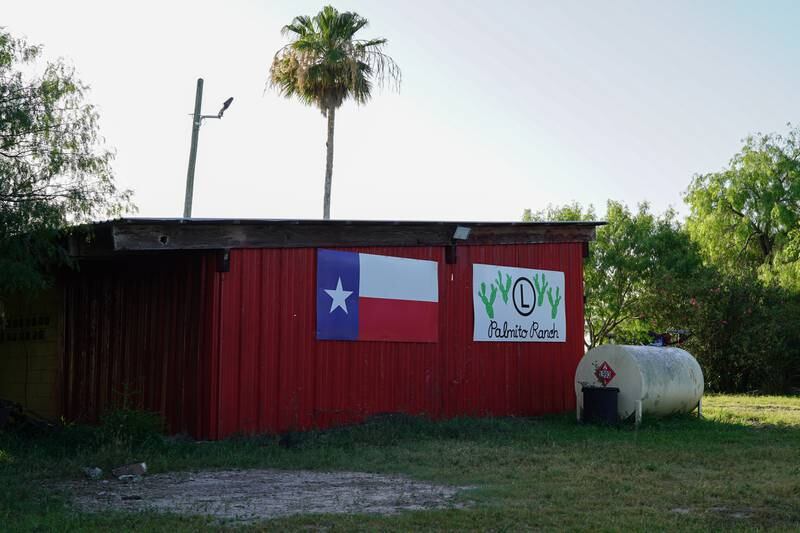 The Texas state flag hangs on the side of a barn owned by Mr Lerma.