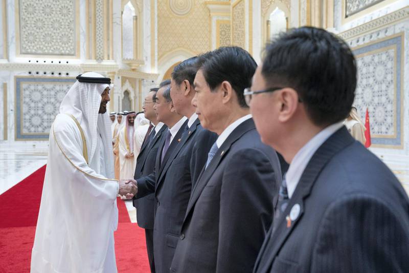 ABU DHABI, UNITED ARAB EMIRATES - July 20, 2018: HH Sheikh Mohamed bin Zayed Al Nahyan, Crown Prince of Abu Dhabi and Deputy Supreme Commander of the UAE Armed Forces (L) greets a member of the Chinese delegation during a reception for HE Xi Jinping, President of China (not shown), at the Presidential Palace. 

( Mohamed Al Hammadi / Crown Prince Court - Abu Dhabi )
---