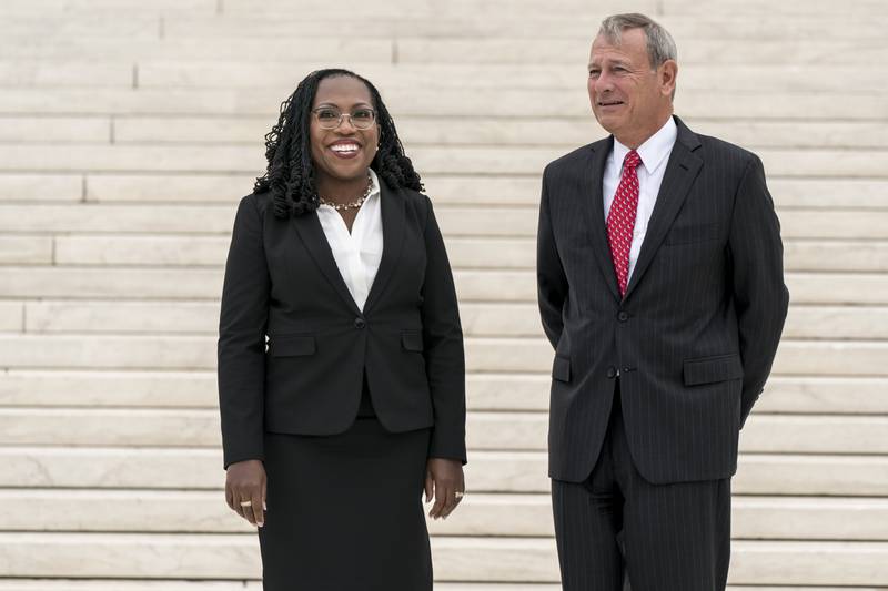 Ms Brown Jackson, seen here with Chief Justice John Roberts, is the first black woman on the US Supreme Court. AP 