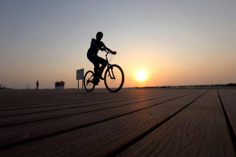 Exercising at sunset is much safer - though it can be humid in the evenings. Satish Kumar / The National