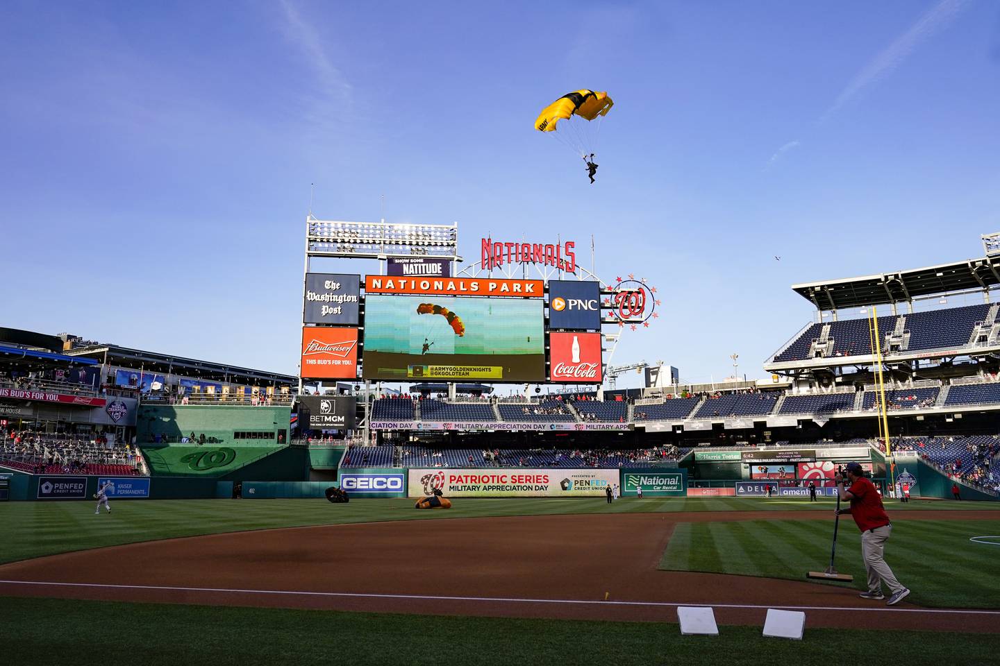 The US Capitol was briefly evacuated after police said they were tracking an aircraft 'that poses a probable threat', but it turned out to be a military aircraft with people parachuting out of it for the Washington Nationals game, officials told AP. AP