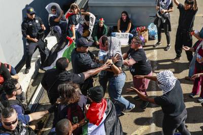Pro-Palestinian supporters during a demonstration near a US military transport vessel at the Port of Oakland in California. AP 
