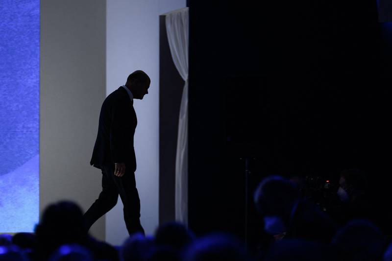 German Chancellor Olaf Scholz leaves the stage after he addressed the assembly during the WEF annual meeting. AFP