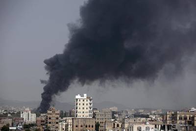 Smoke rises after Saudi-led airstrikes hit a factory in Sanaa, Yemen, on August 9,  2016.  Hani Mohammed / Associated Press 