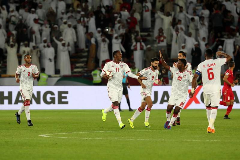 United Arab Emirates' forward Ahmed Khalil, second left, celebrates after scoring a goal. AFP