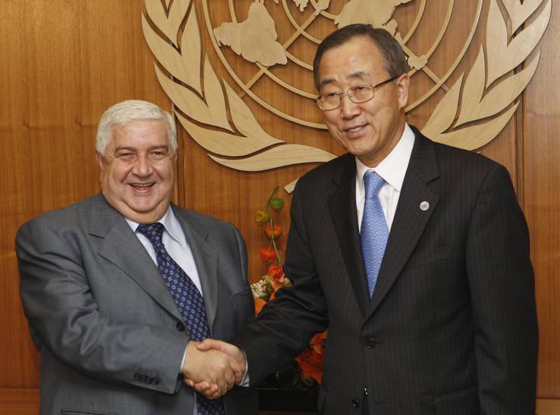 Walid Al-Moualem (L), Syria's Foreign Minister shakes hands with United Nations Secretary General Ban Ki-Moon (R),  28 September 2007, during the United Nations General Assembly at UN headquarters in New York.  AFP PHOTO/Stan HONDA (Photo by STAN HONDA / AFP)