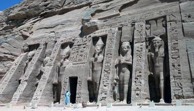 A guard at the temple of Queen Nefertari at Abu Simbel, Egypt. Tourism in Egypt was affected by the Covid-19 pandemic. EPA