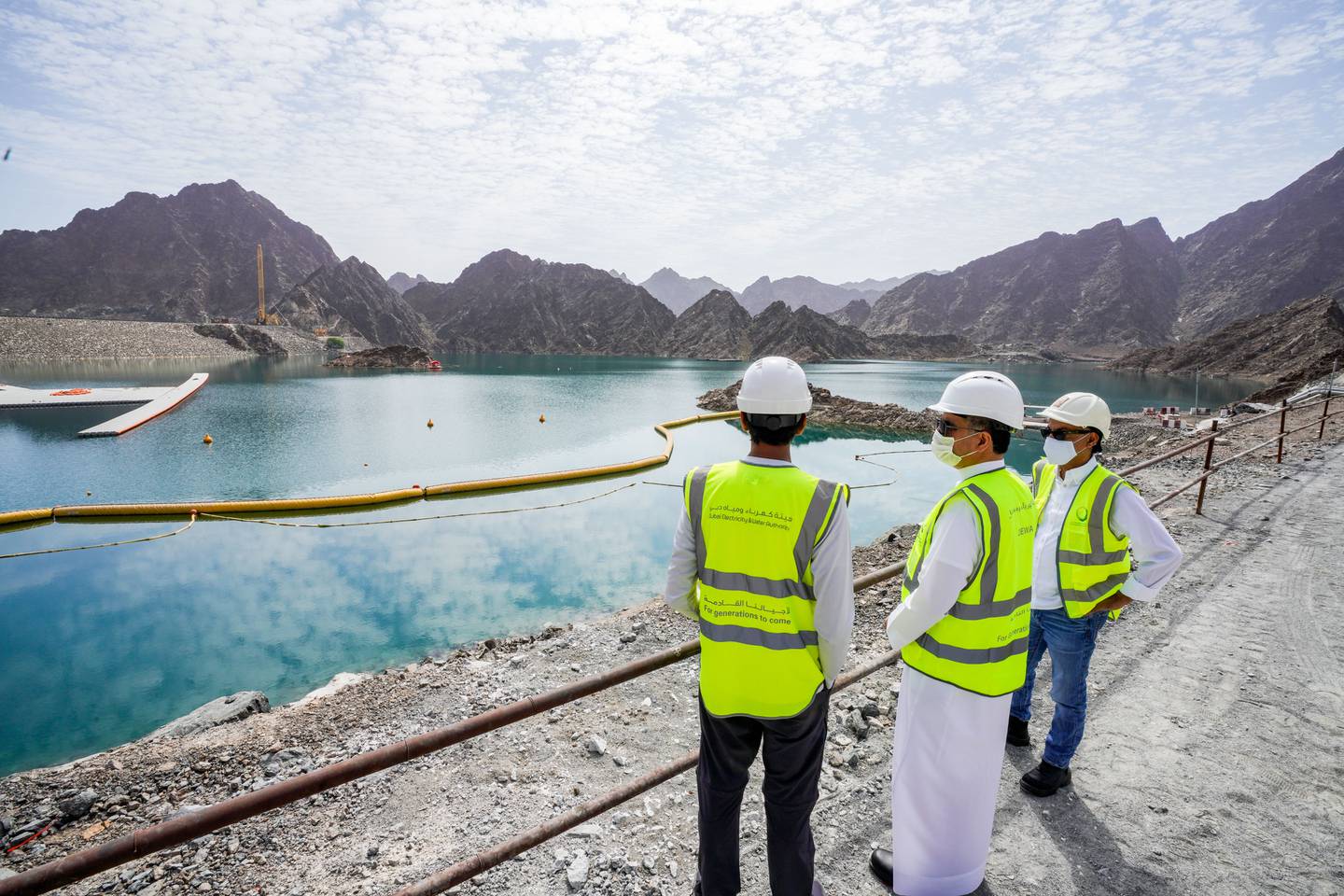 Saeed Al Tayer, centre, managing director of Dewa, recently reviewed the work taking place on the Dubai Mountain Peak and Hatta Sustainable Waterfalls projects. Photo: Dubai Media Office