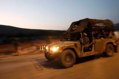 Israeli troops patrol as tensions escalate in the West Bank town of Hawara. EPA
