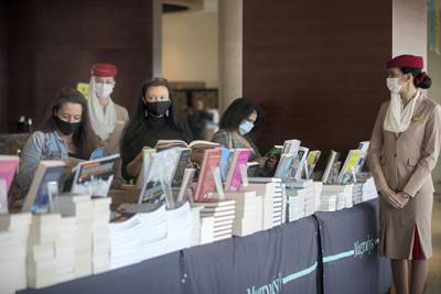 Duba, United Arab Emirates -  Book enthusiasts checking out books from different authors at the Emirates Airline Festival of Literature at InterContentinental Hotel Dubai Festival City.  Leslie Pableo for The National for Razmig's story