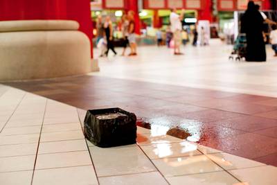 Dubai, United Arab Emirates, April 7, 2013:    Water leaks through the roof after heavy rain at Ibn Battua Mall in Dubai on April 7, 2013. Christopher Pike / The National