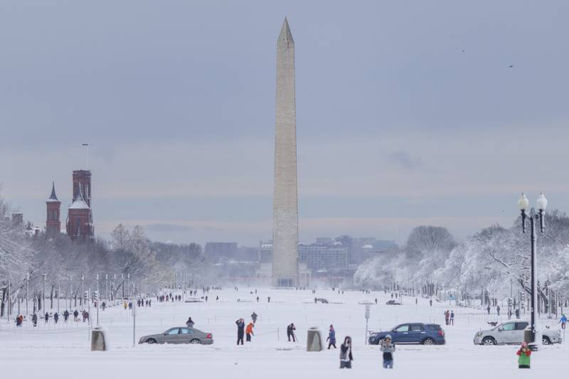 Snow covers the National Mall grounds in Washington. Bloomberg