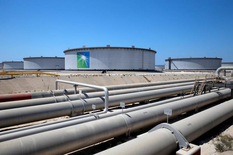FILE PHOTO: General view of Aramco tanks and oil pipe at Saudi Aramco's Ras Tanura oil refinery and oil terminal in Saudi Arabia May 21, 2018. Picture taken May 21, 2018. REUTERS/Ahmed Jadallah/File Photo