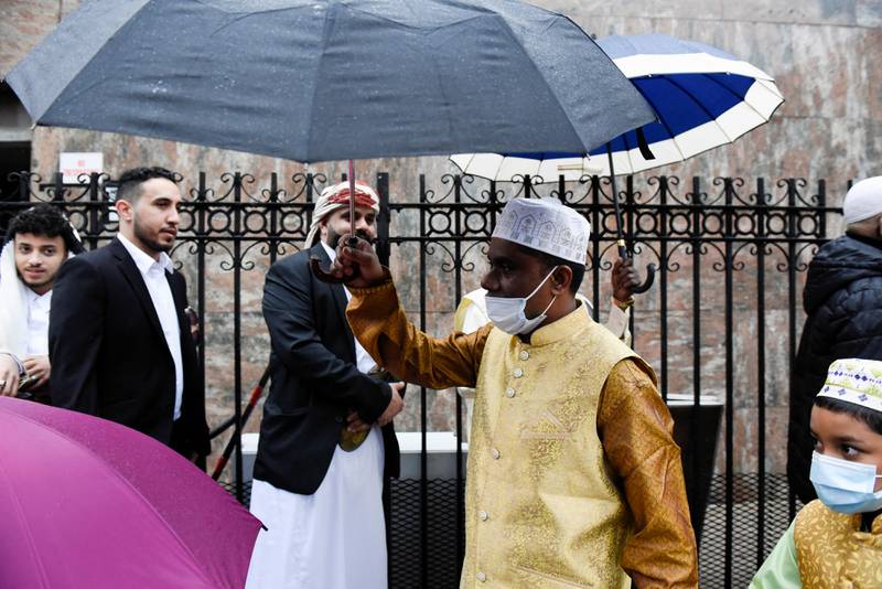 People celebrate Eid Al Fitr, rain or shine. Reuters