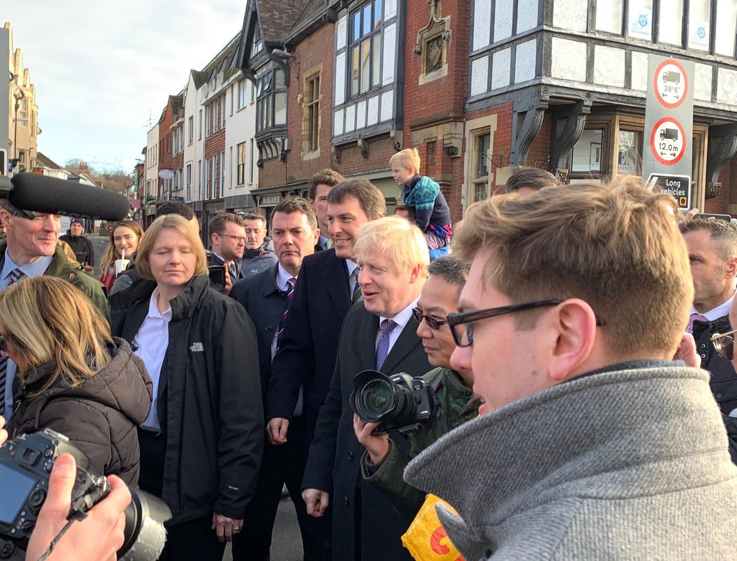 UK Prime Minister Boris Johnson walks around Salisbury with local Member of Parliament John Glenn, who was re-elected as the town's MP last month. Peter Cooper for The National.