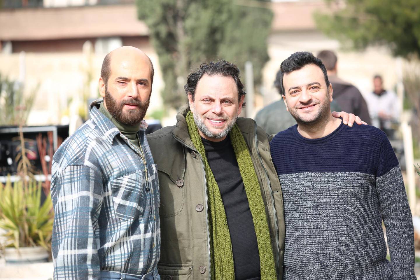 Director Seif Sbei, centre, poses with scriptwriters Yamen Al Hajali, left, and Ali Wajeeh. Courtesy Seif Sbei
