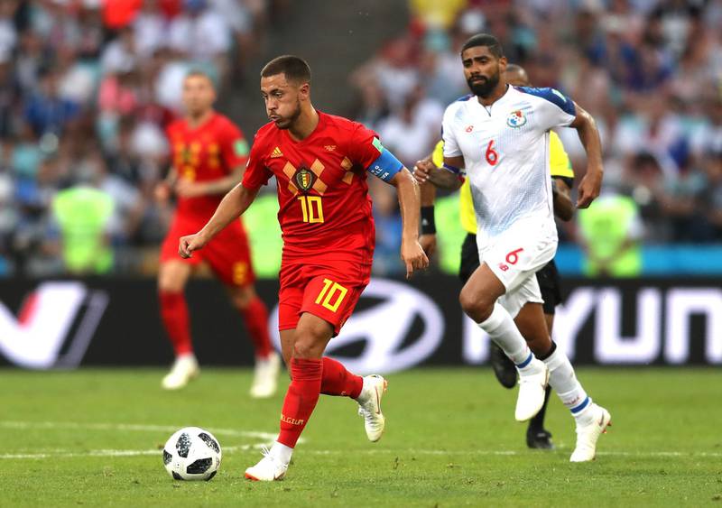 Eden Hazard of Belgium runs with the ball under pressure from Gabriel Gomez of Panama. Francois Nel / Getty Images