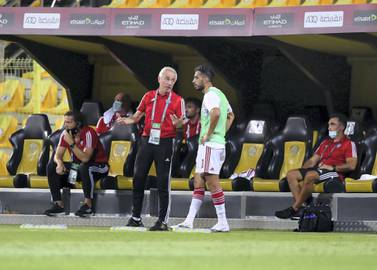 UAE manager Bert van Marwijk speaks to Majed Hassan during the game against Thailand in the World Cup qualifiers at the Zabeel Stadium, Dubai. Chris Whiteoak / The National.