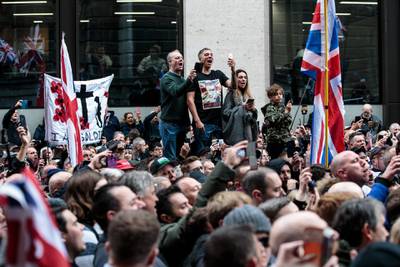 LONDON, ENGLAND - OCTOBER 23: Supporters of far-right figurehead Tommy Robinson, real name Stephen Yaxley-Lennon gather outside the Old Bailey on October 23, 2018 in London, England. The Former English Defence League leader and British National Party member is facing a re-trial on charges of contempt. (Photo by Jack Taylor/Getty Images)