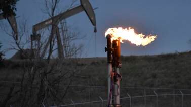 A flare to burn methane from oil production near Watford City, North Dakota. The oil and gas industry's Cop28 methane pledge has been praised, but concerns linger about its implementation. AP