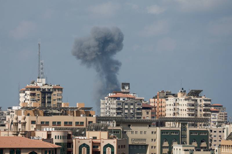 Smoke rises over Gaza City on a second day of Israeli air strikes. Reuters