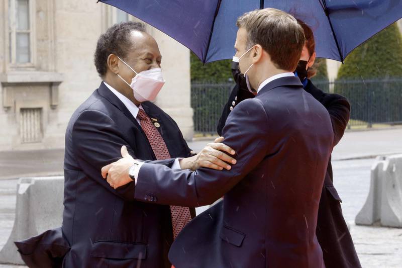 French President Emmanuel Macron welcomes Sudan's Prime Minister Abdalla Hamdok prior to an international conference on Sudan which aims to provide financing breathing room for its Prime Minister as he pursues economic reforms in Paris. AFP