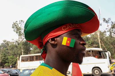 A vendor sells Cameroon football attire in Yaounde. AFP