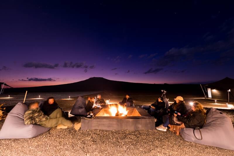 An exceptional camping experience among the black volcanic rocks, with music 