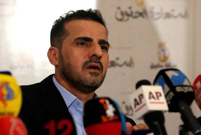 Hussein Munis gives a press conference to announce his party's electoral programme for the upcoming elections. AFP